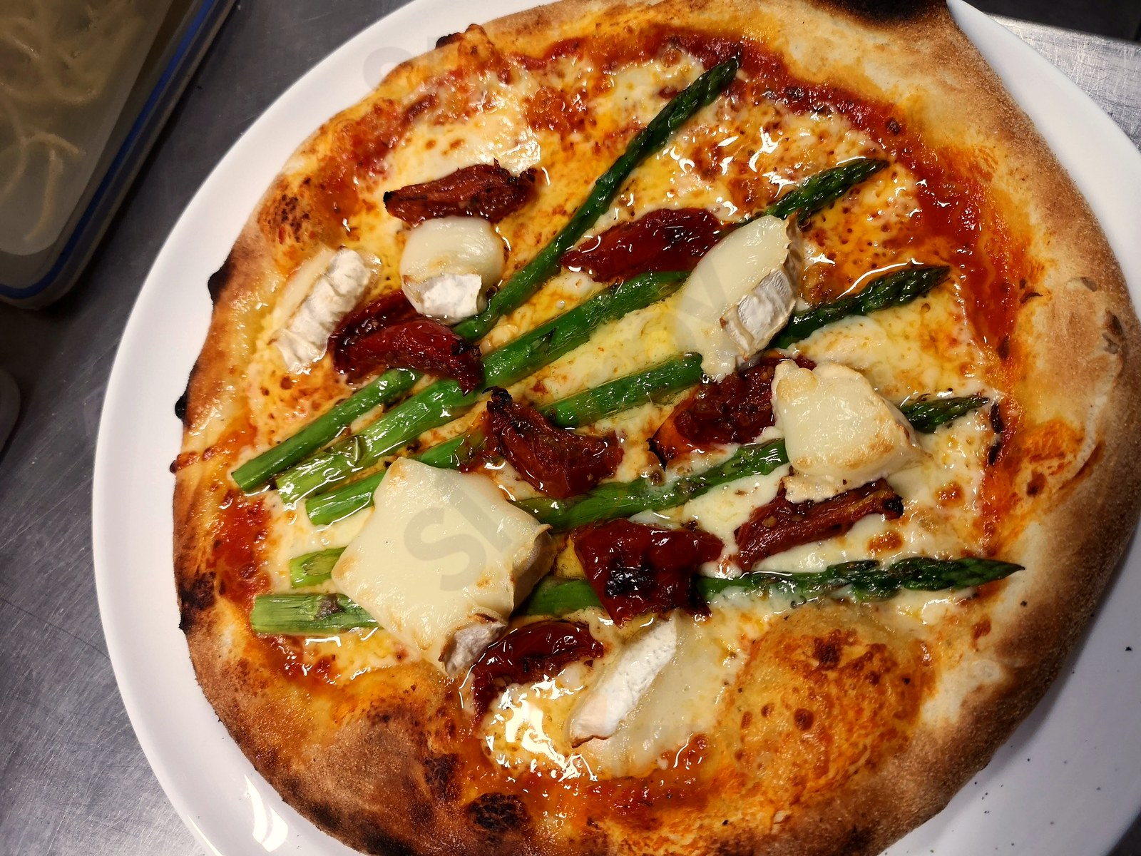 Goat cheese and asparagus pizza at Il Piatto